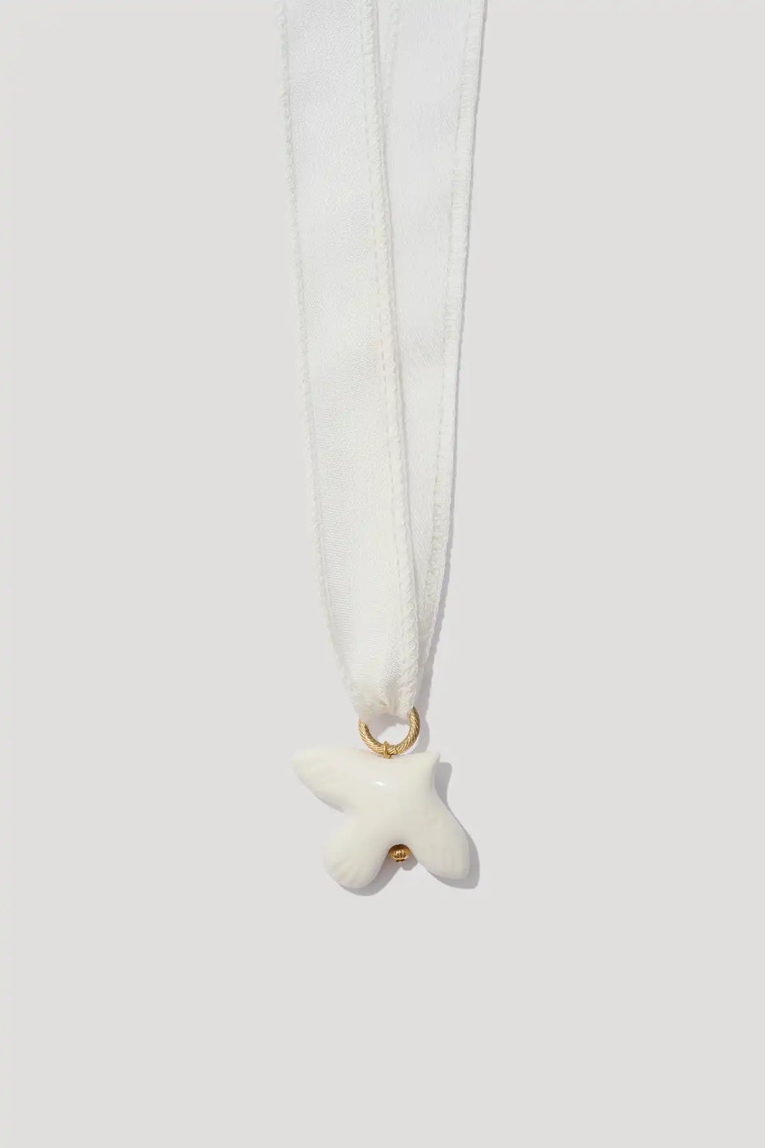 PALOMA pendant on wide ribbons