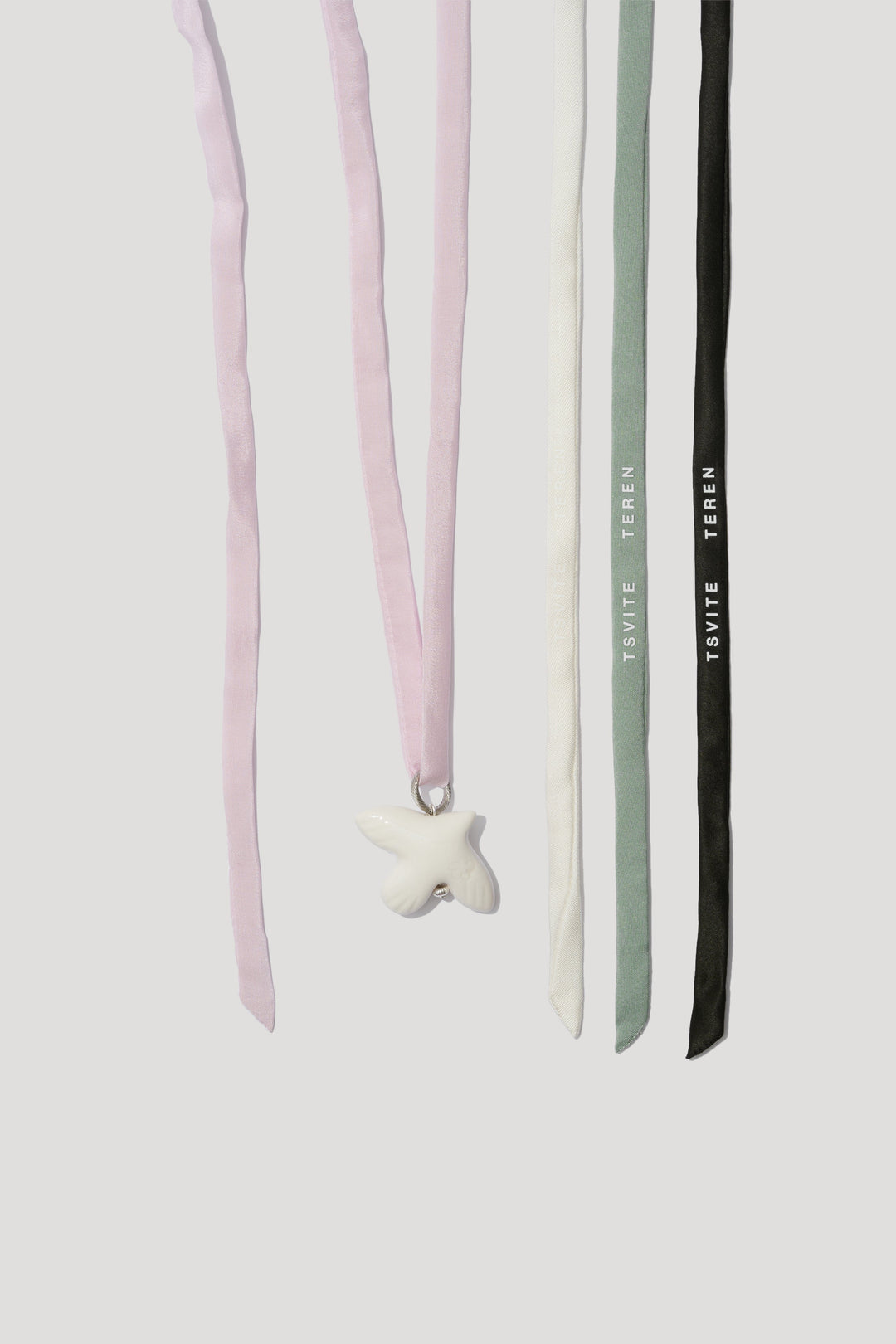 PALOMA pendant on narrow ribbons