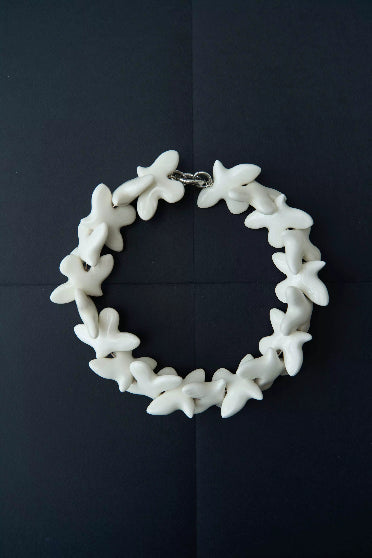 мирні кольоє з кераічних пташок