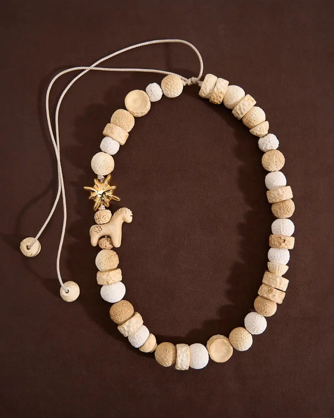 Кольє DRIMOTA з молочених порцелянових намистин з золотою зіркою