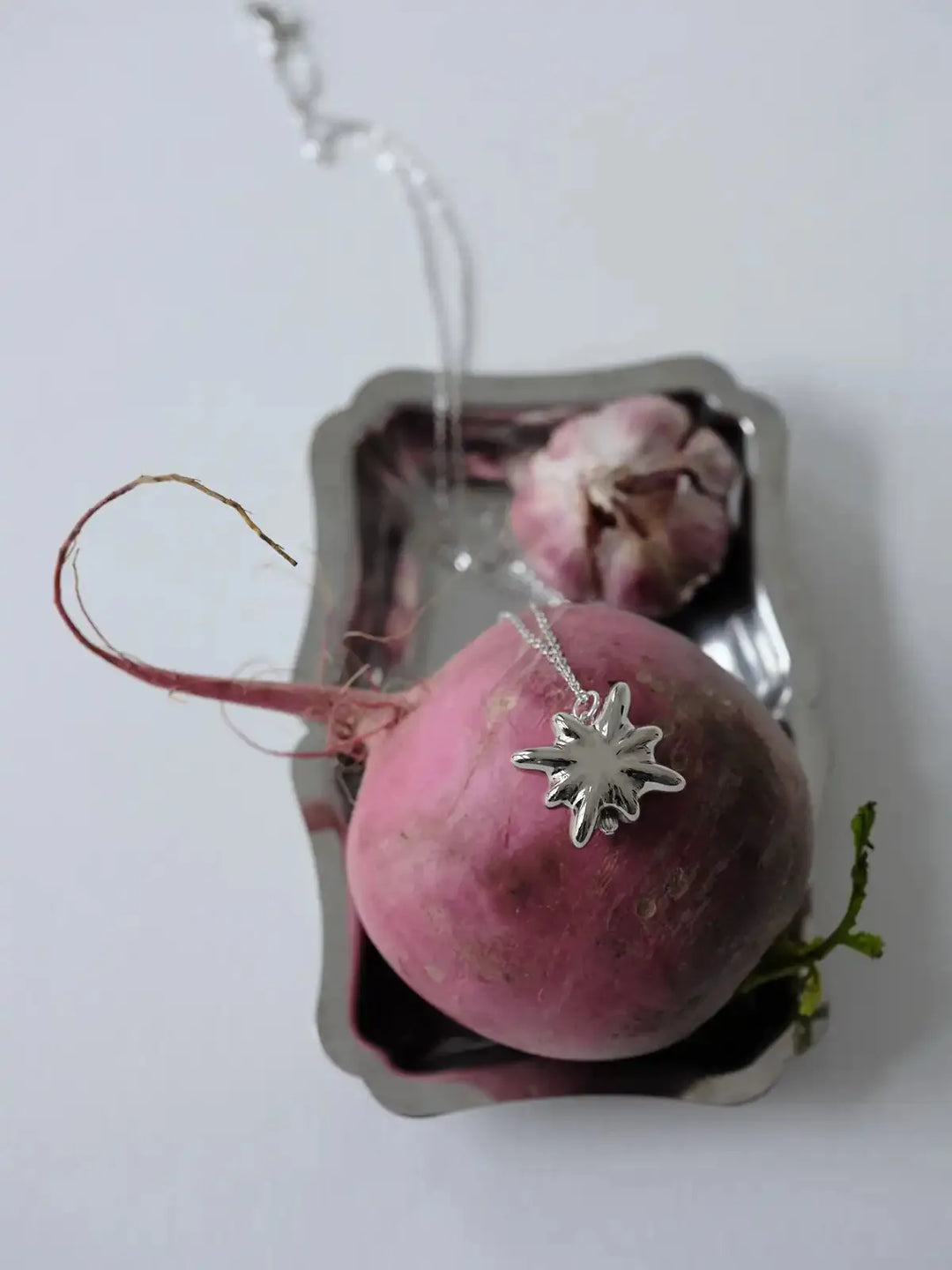 Drimota Pendant in Platinum-Coated Star Shape