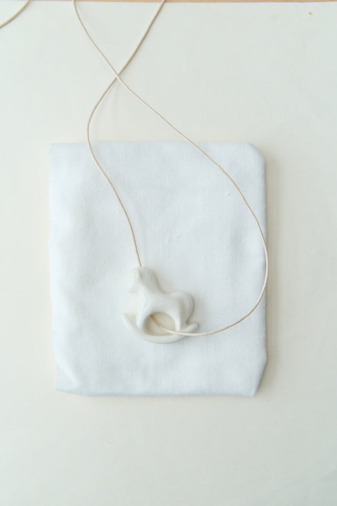 Liuli White Rocking Horse Pendant