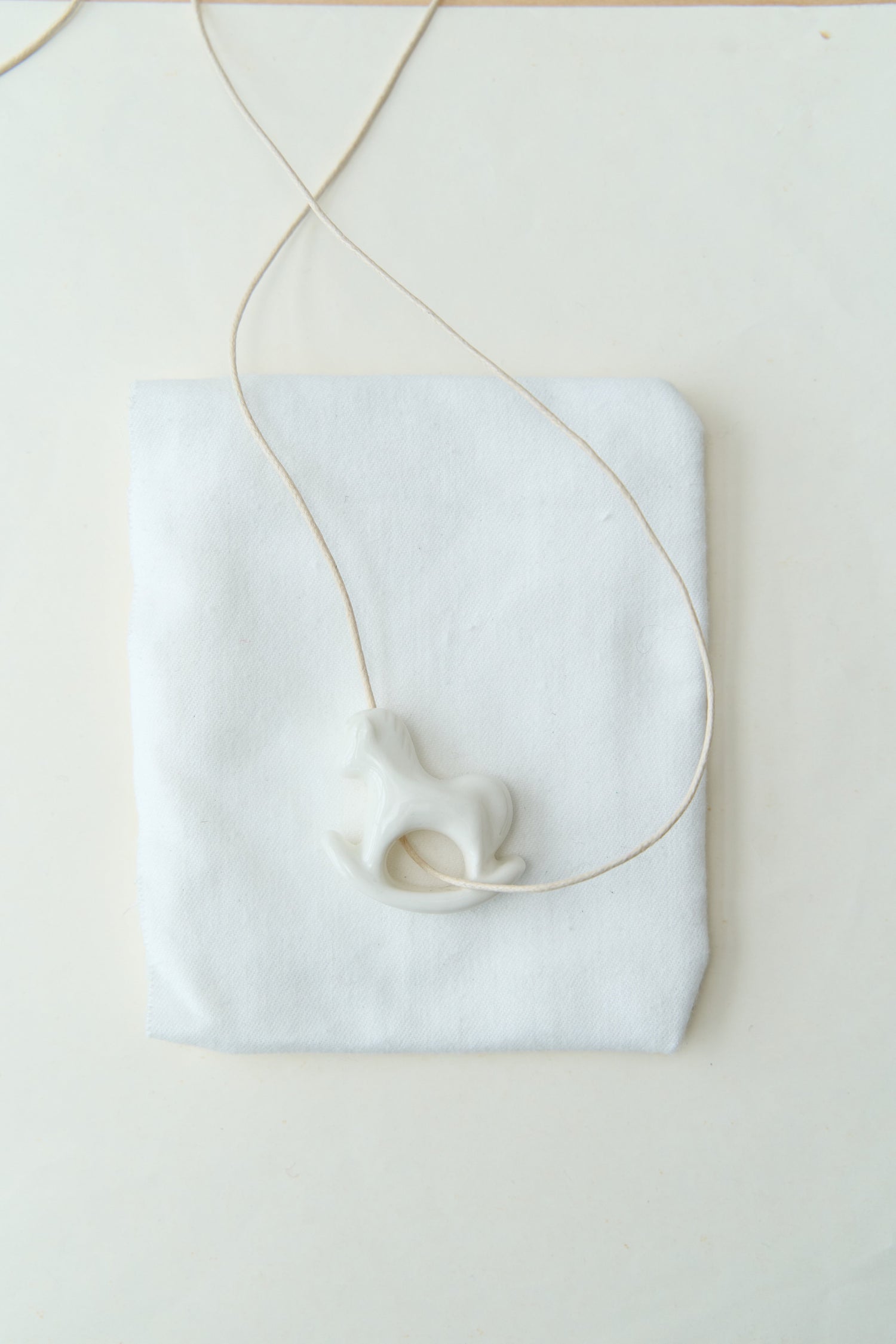 Liuli White Rocking Horse Pendant