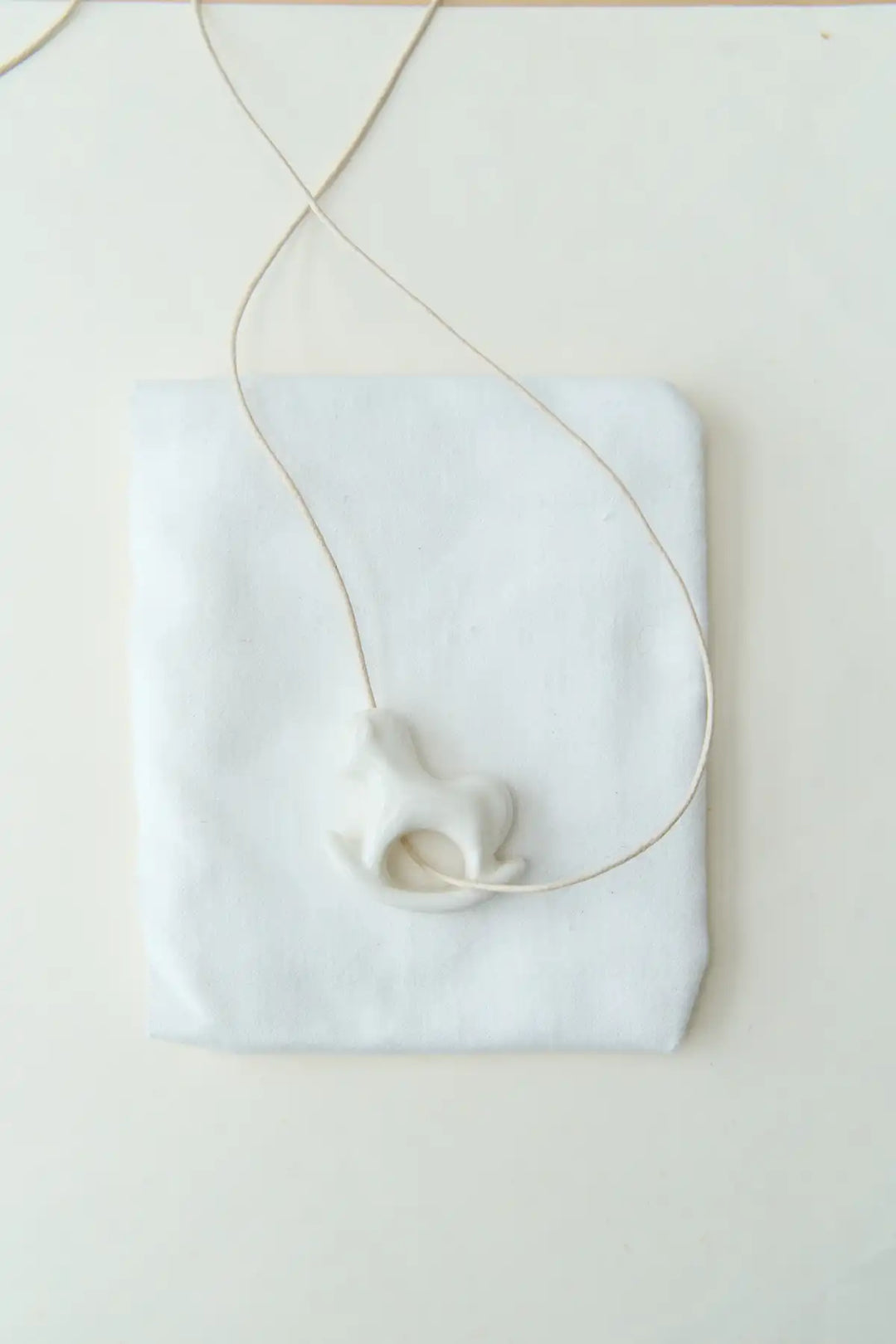 Liuli White Rocking Horse Pendant