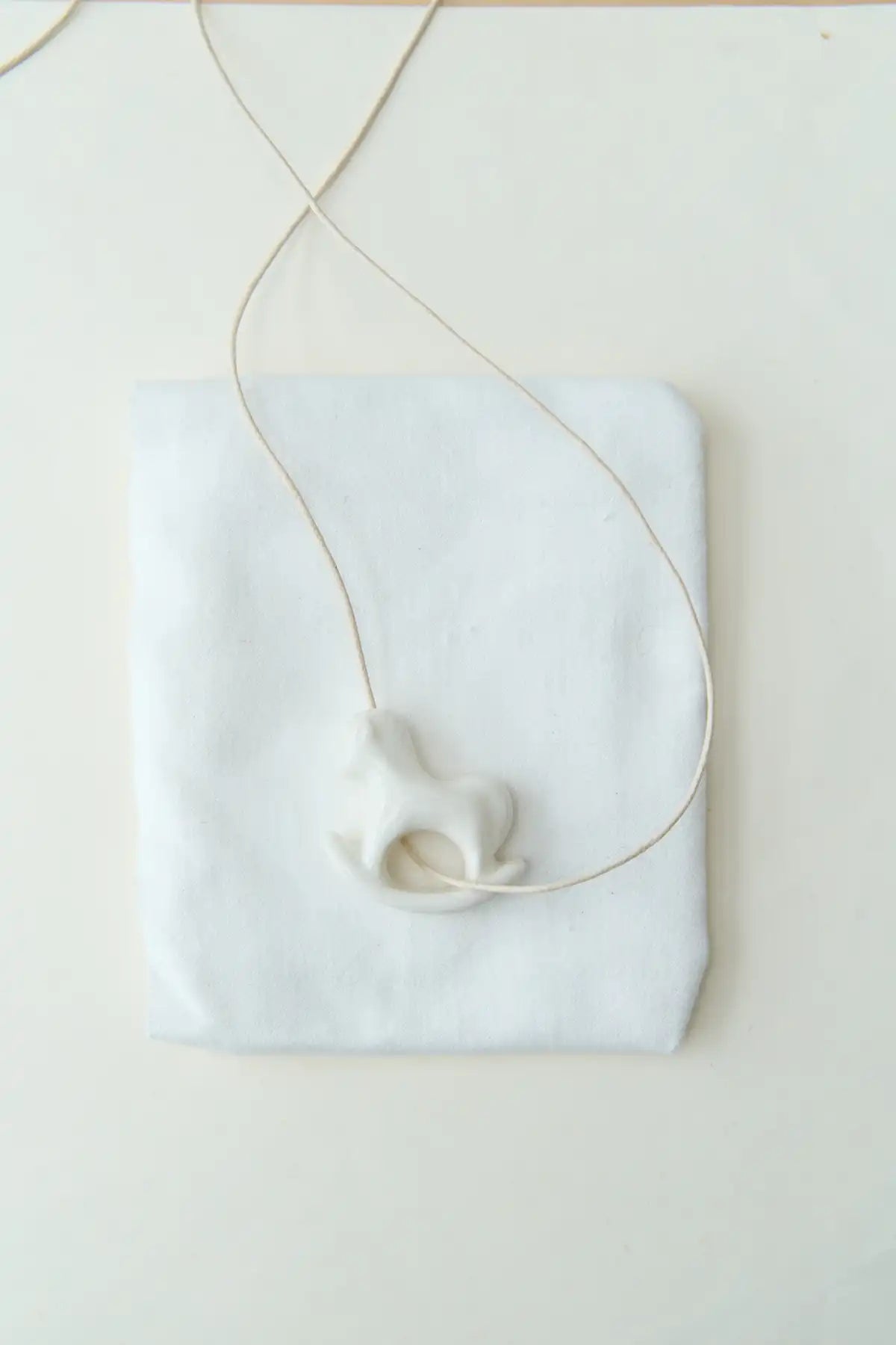 Liuli White Rocking Horse Pendant