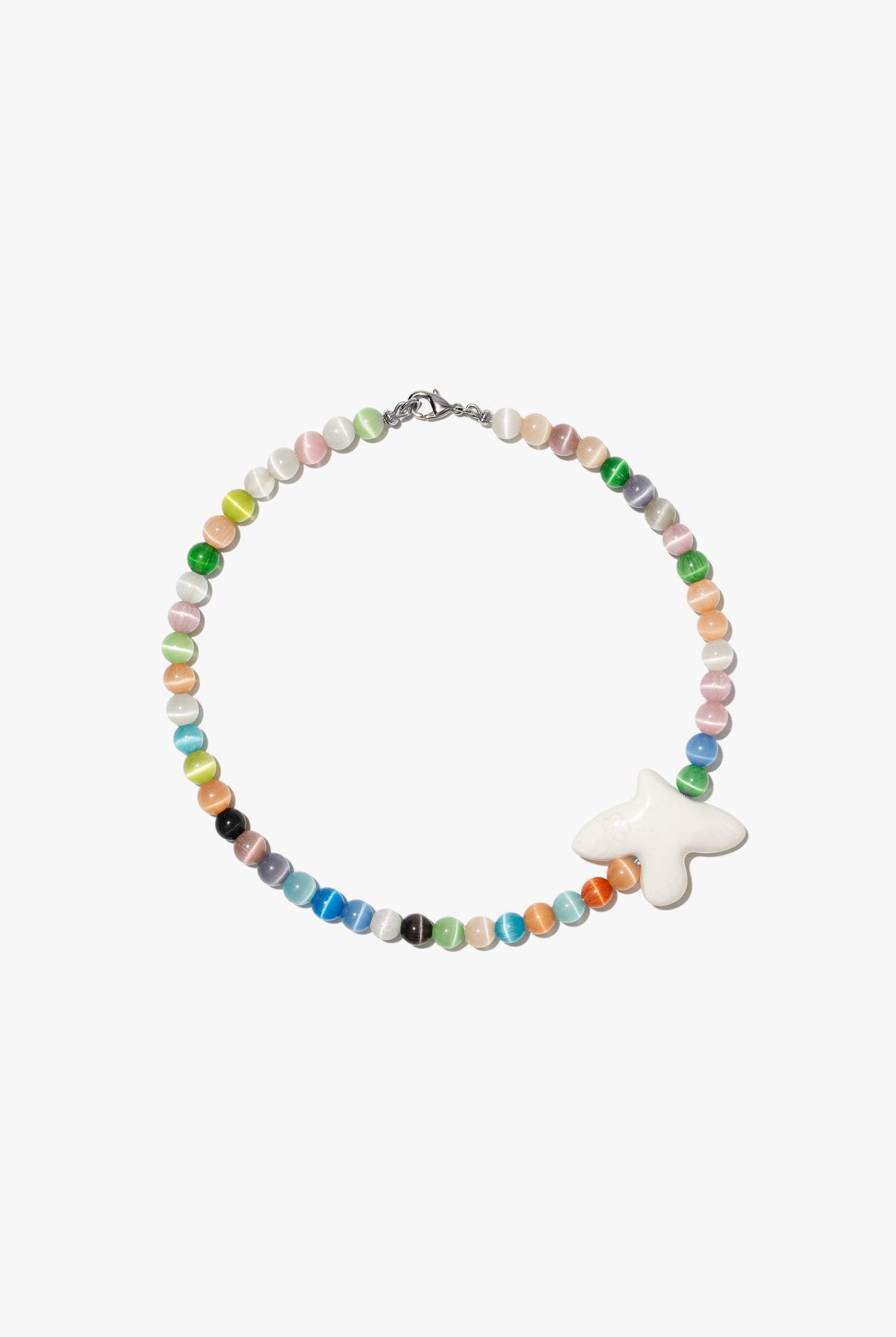 MYRNI necklace with cat’s eye stone and bird