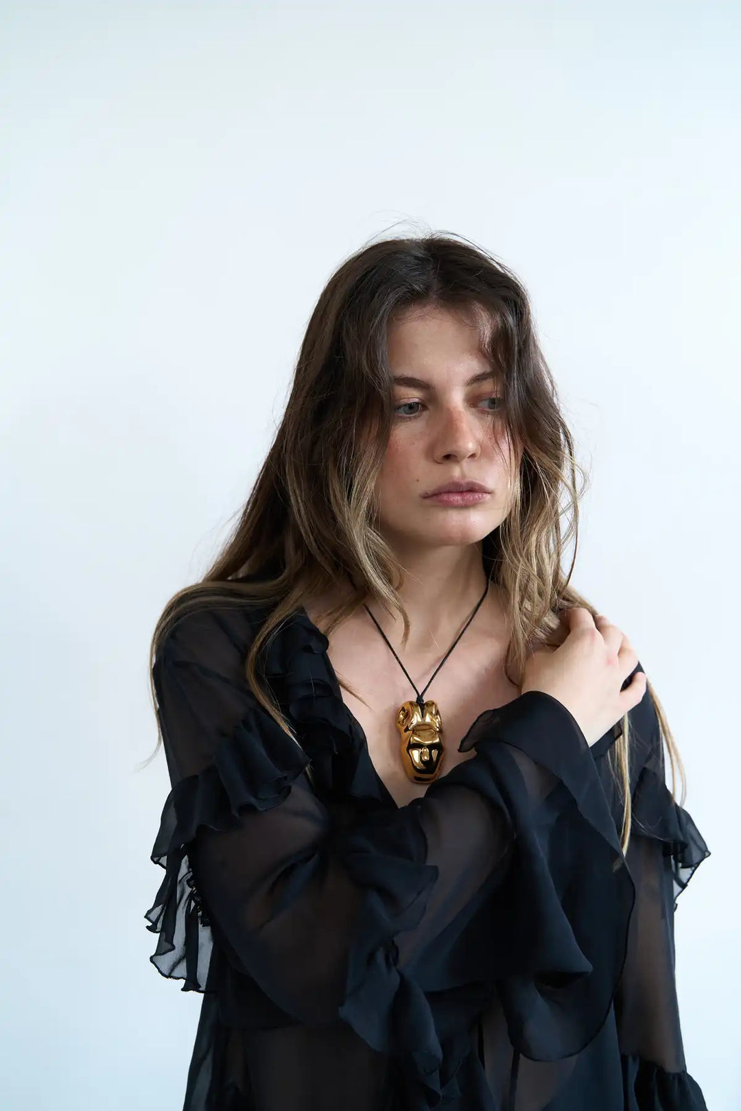 Pamfir Gold-Coated Mask Pendant