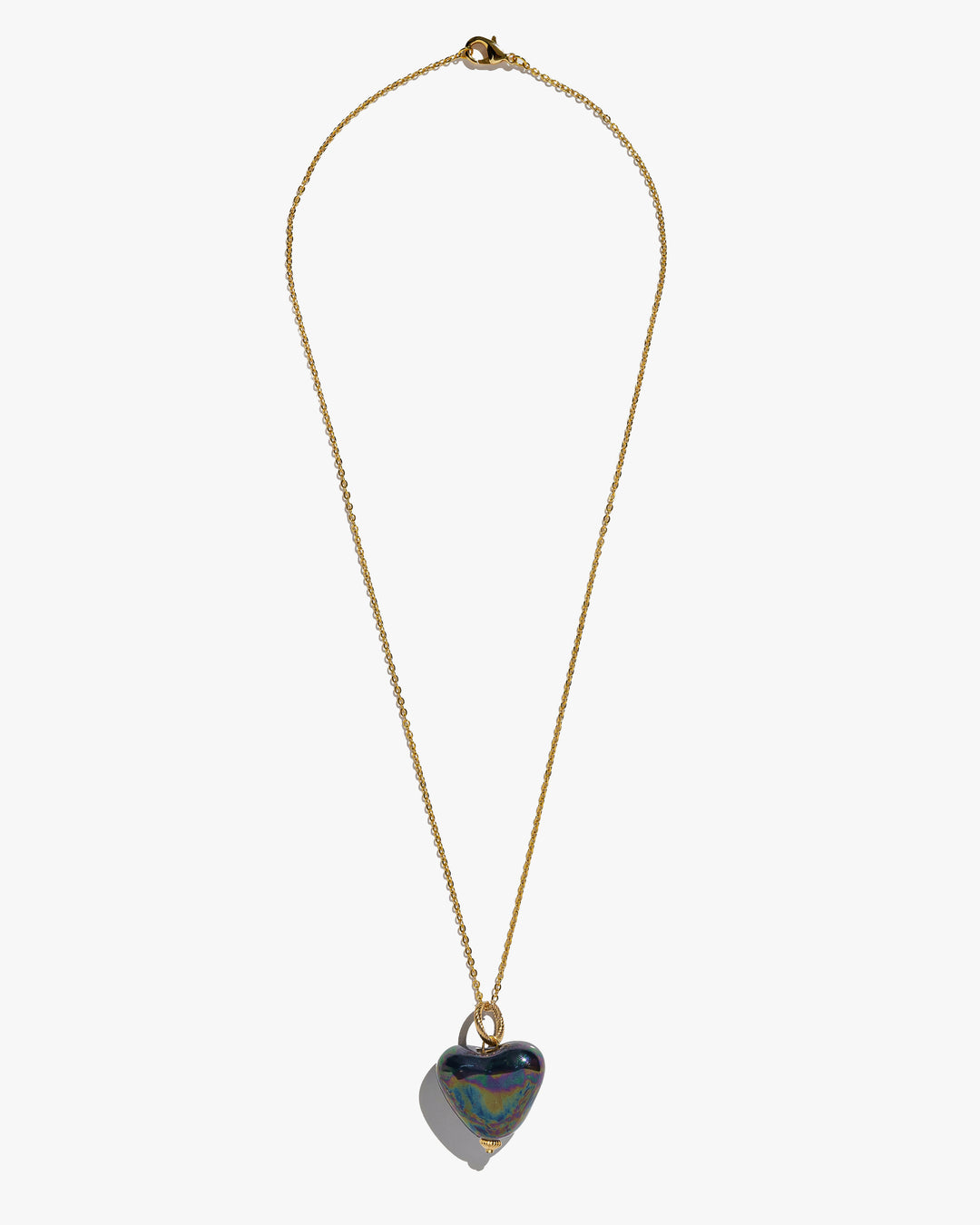 SKARB pendant with a black heart on a chain