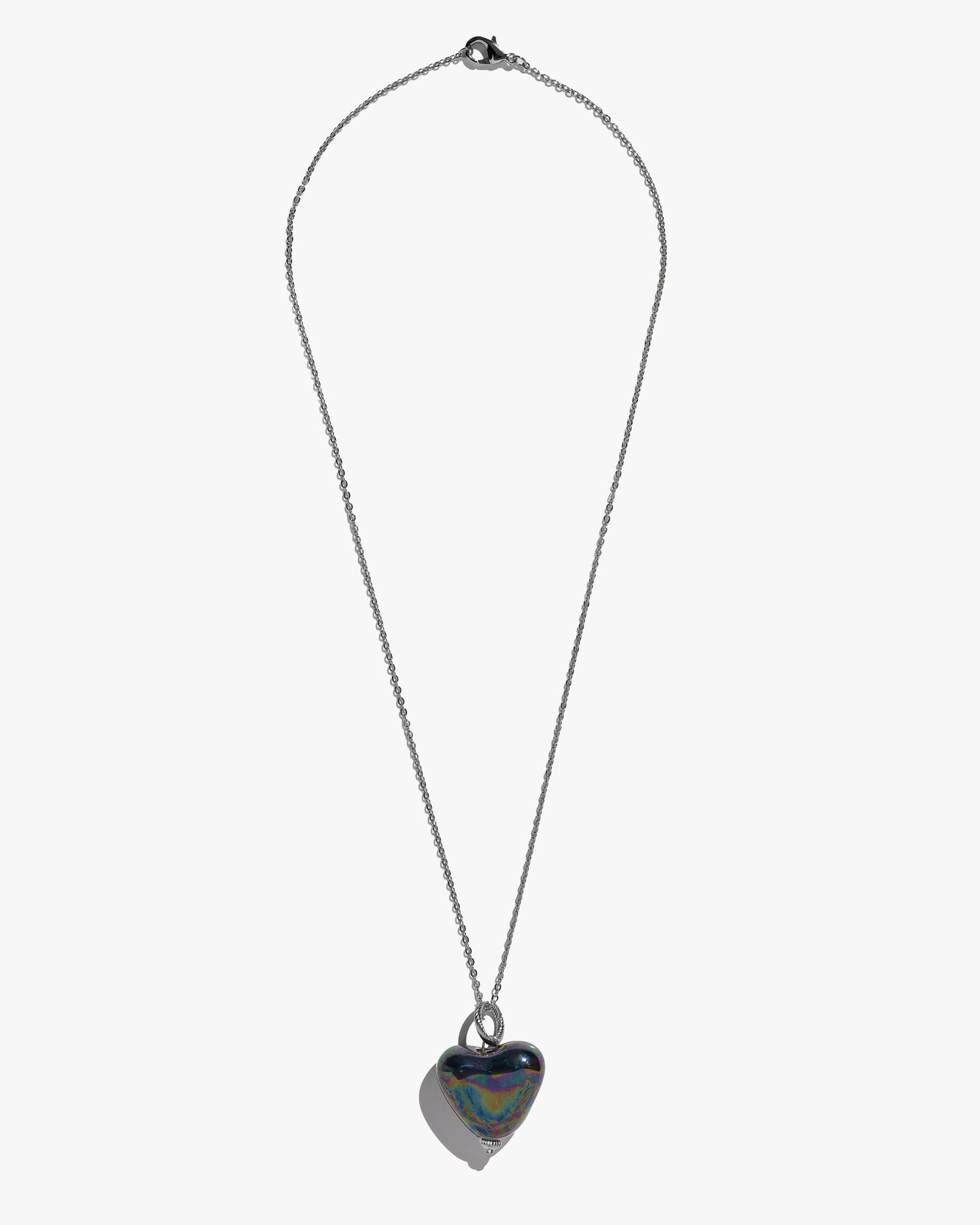 SKARB pendant with a black heart on a chain