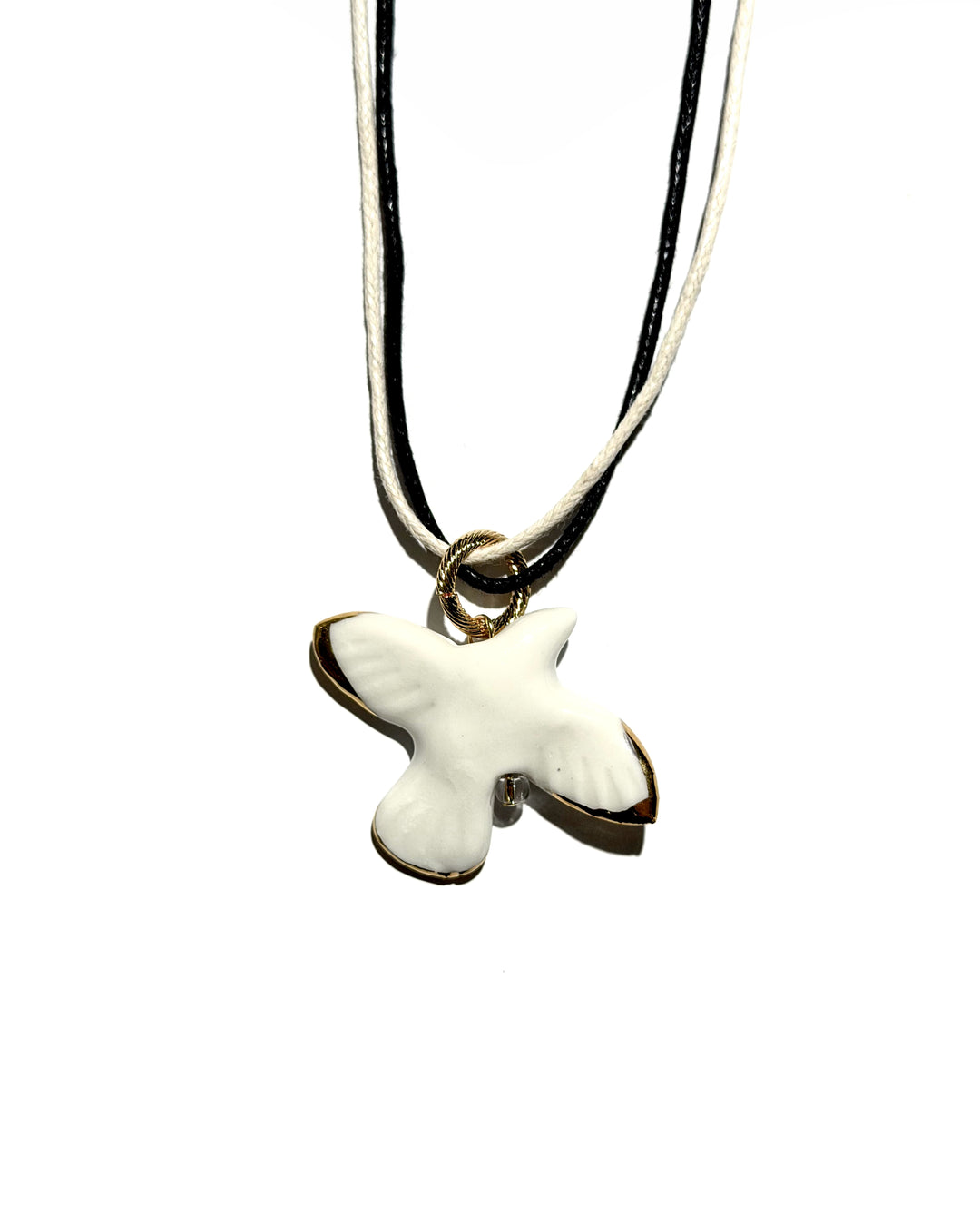 Pendentif MYRNI WABI-SABI oiseau aux ailes dorées sur cordon