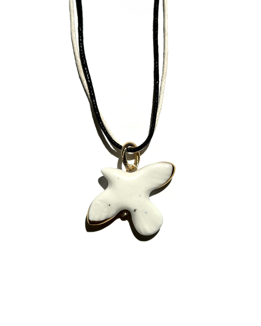 Pendentif MYRNI WABI-SABI oiseau aux ailes dorées sur cordon