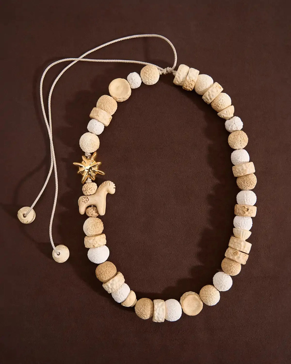 Drimota Necklace with Milky Beads and Gold-Coated Star