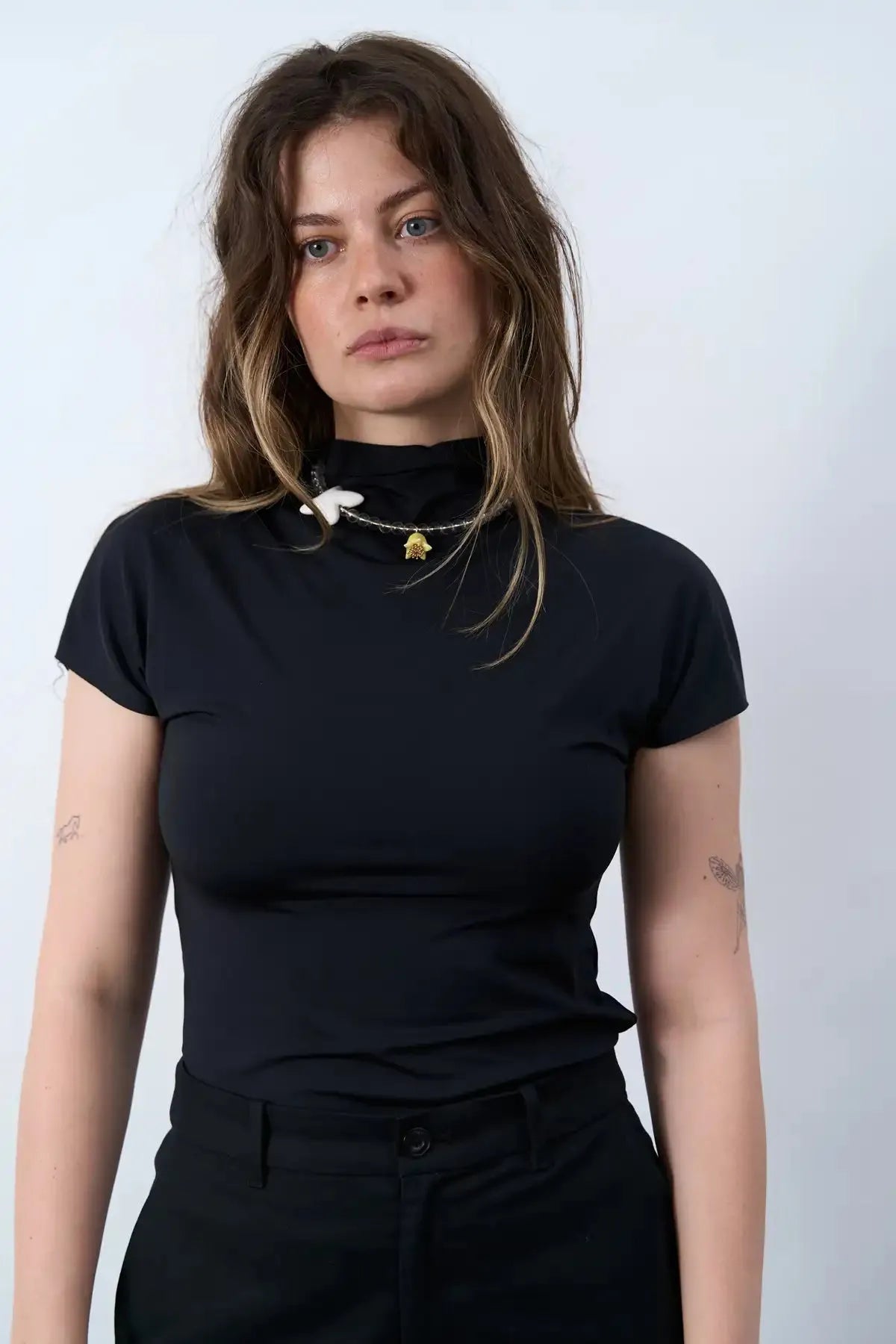 POLYSK necklace with crystal, bird, and yellow bell flower
