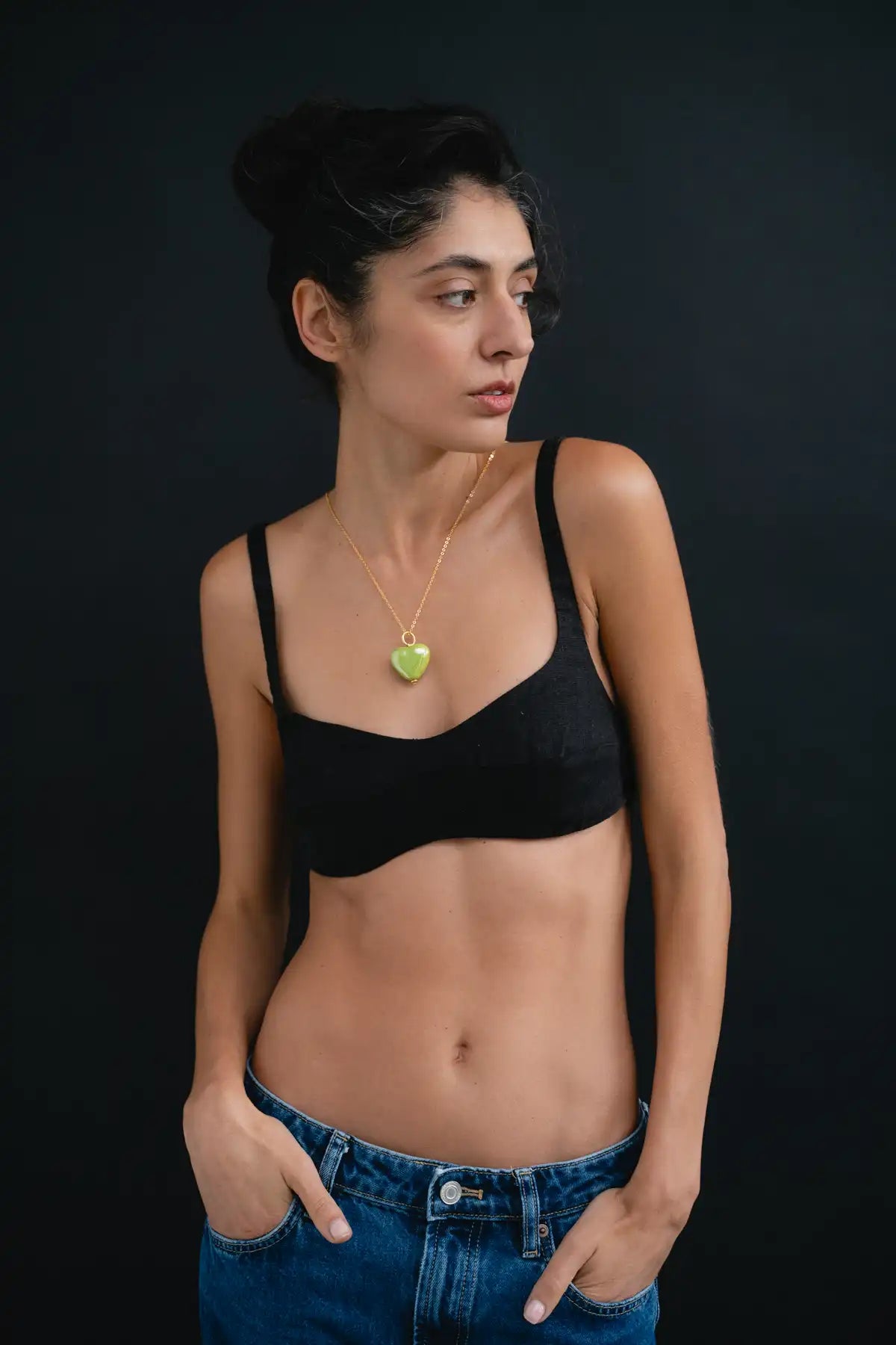 SKARB pendant with a green heart on a chain