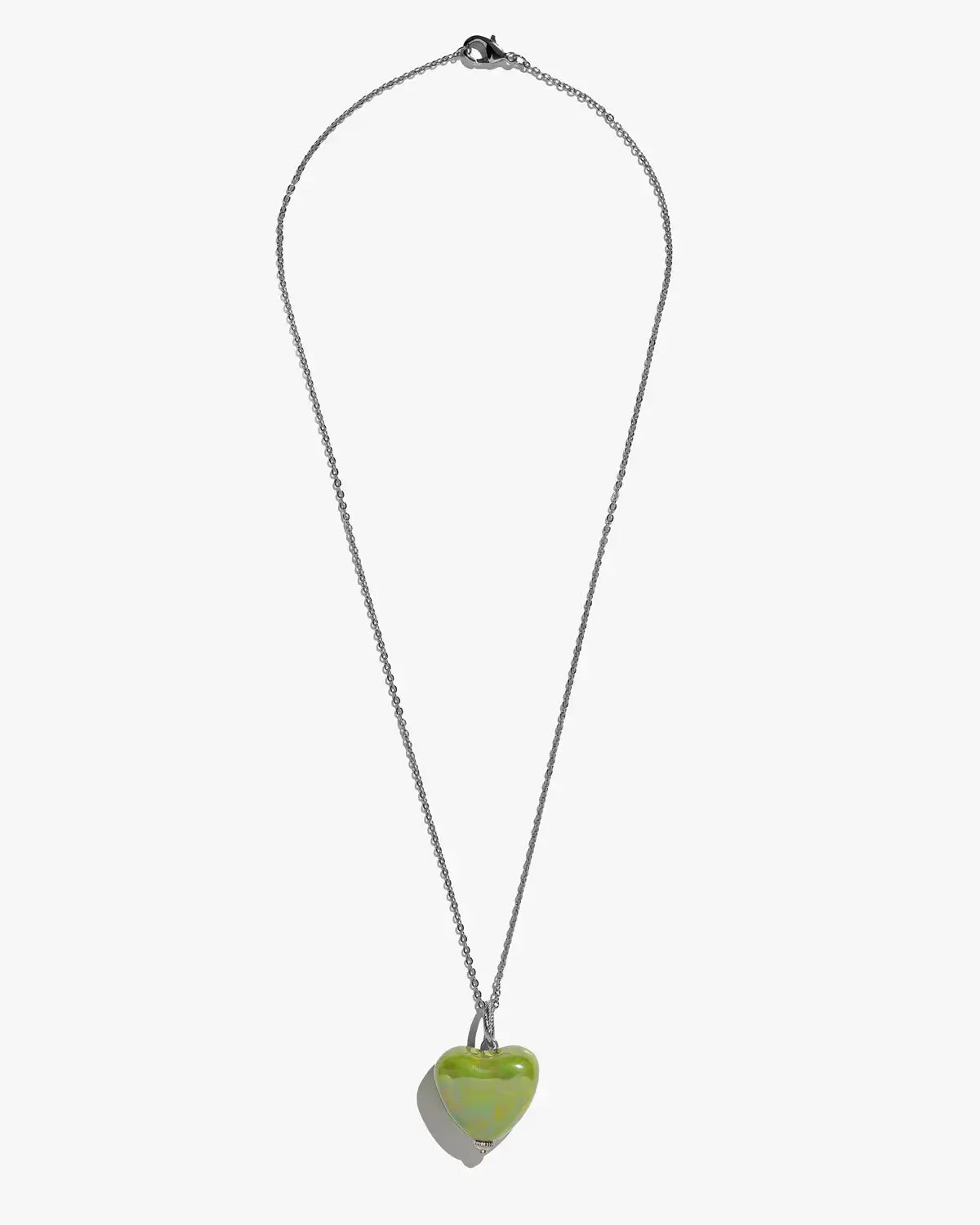 SKARB pendant with a green heart on a chain