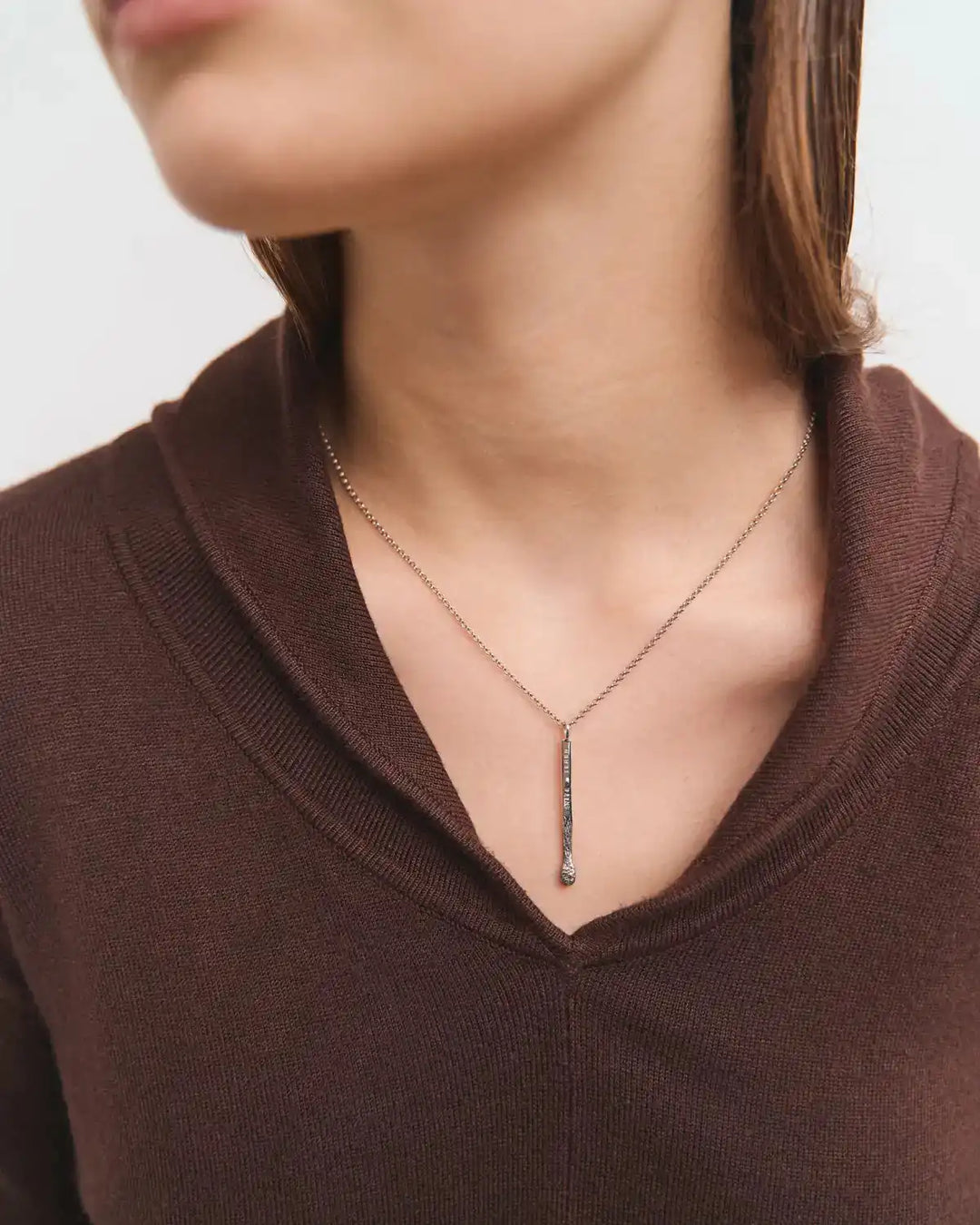 Підвіс 6.674 у формі срібного тліючого сірника