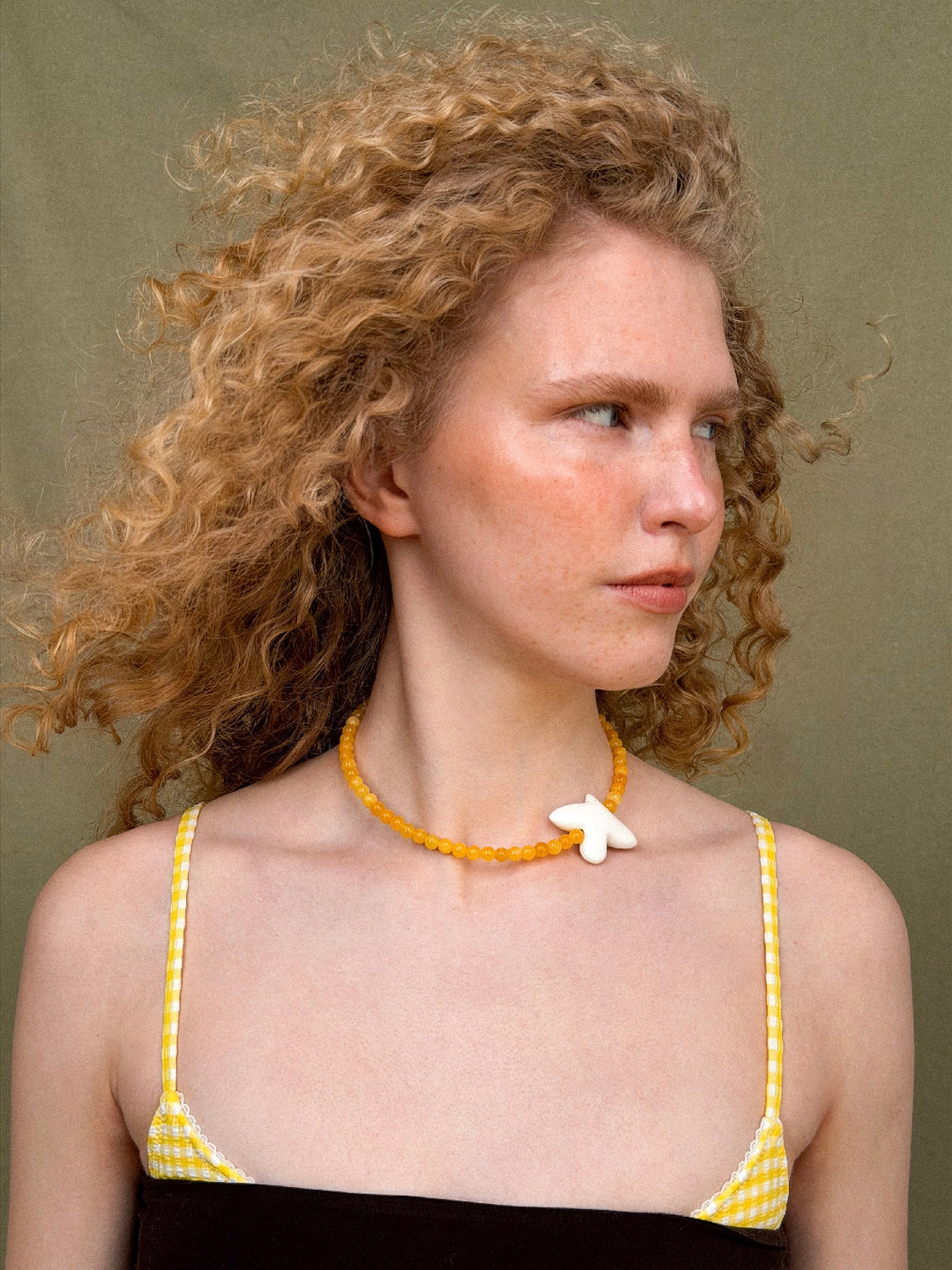 MYRNI necklace with citrine and bird