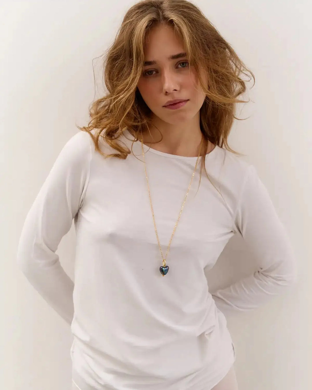 SKARB pendant with a small blue heart on a chain