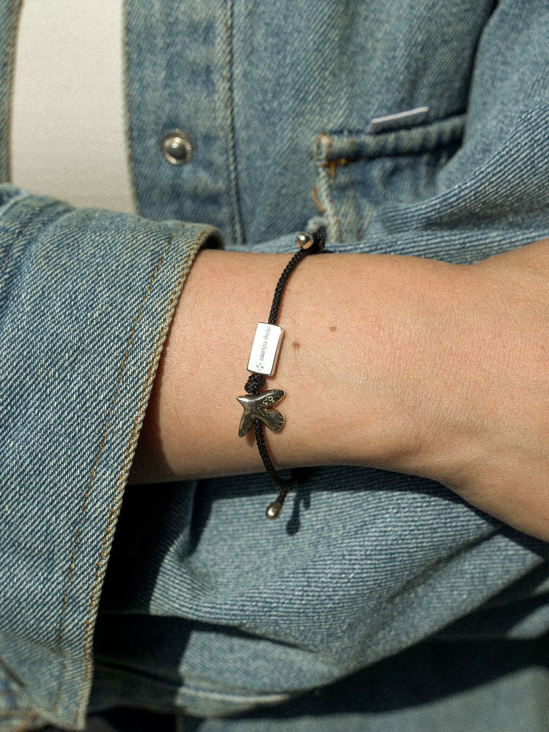 ZAVTRA BUDE bracelet with black cord