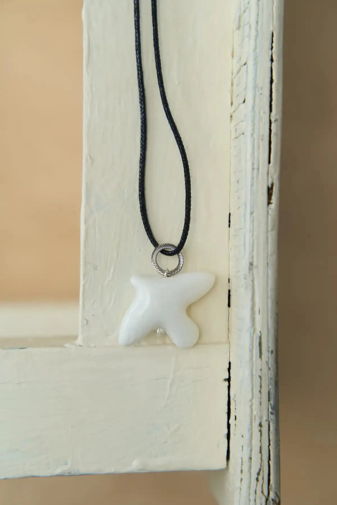 Підвіс MYRNI з пташкою на ланцюжку